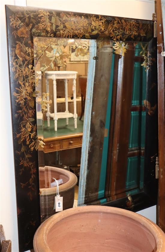 A bevelled edge mirror with lacquer frame, overlapping decor H.106cm